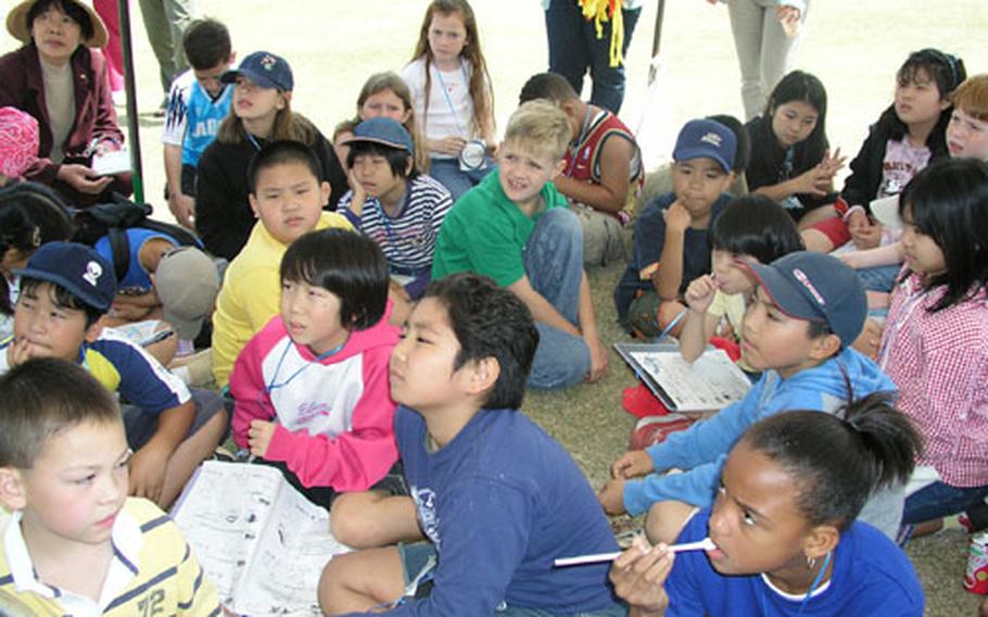 Third graders from Kadena Elementary School participated in a cultural exchange event recently at the Okinawa Zoo. Their counterparts were from Shimabukuro Elementary School in Okinawa City near the air base.